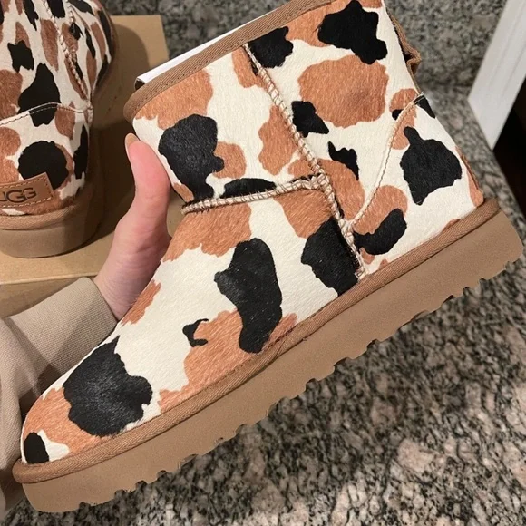 UGG® Classic Mini Cow Print Boots - Picture 9 of 10
